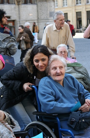 Older woman in wheelchair with young woman